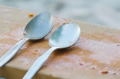 Two Spoons on Cutting Board Stock Photos