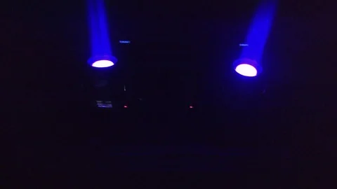 Two spotlights of purple color on the ceiling of the techno club blink and 스톡 동영상 88208695
