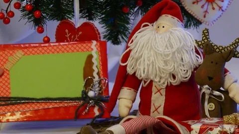 Two Spotted Boxes With Photo Frames Are Placed Under a Christmas Fir Tree and Stock Footage 72548878