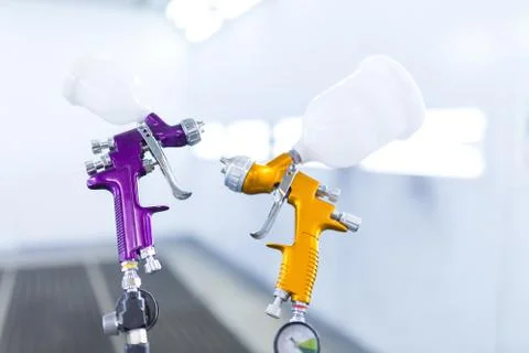 Two spray gun workshop in paint chamber Stock Photos