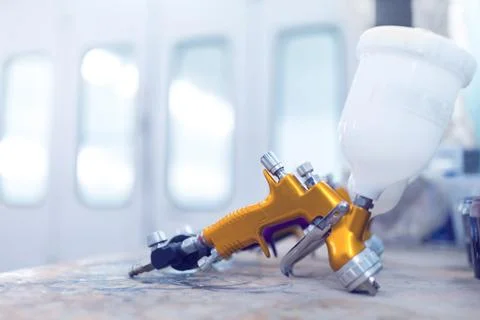 Two spray gun workshop in paint chamber Stock Photos