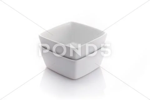 Two square china bowls isolated on a white background Stock Photos