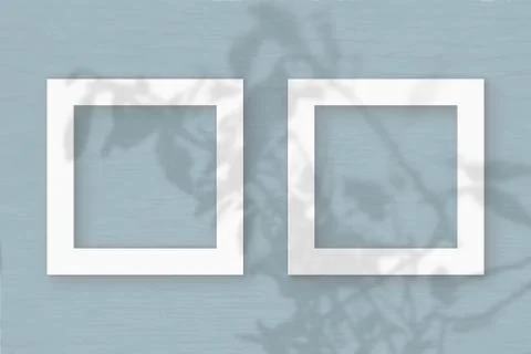 Two square frames sheet of white textured paper on the blue-grey wall backgro Stock Illustration