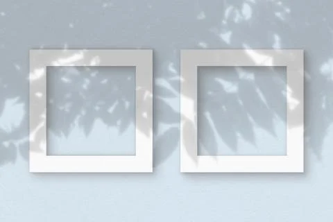 Two square sheet of white textured paper on the blue wall background. Mockup  Stock Illustration