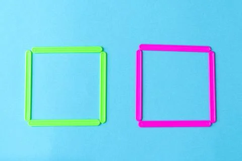 Two squares of counting plastic sticks designed for teaching counting to young Stock Photos