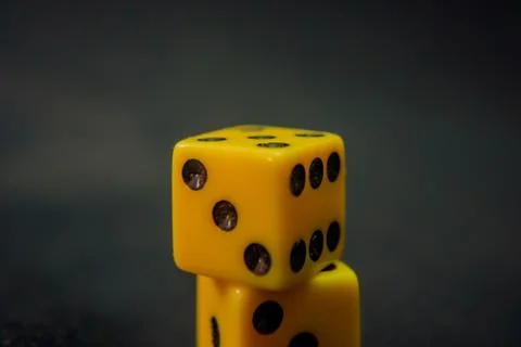 Two Stacked six sided dice on background Stock Photos