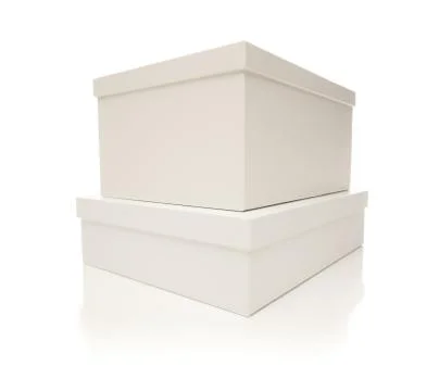 Two Stacked White Boxes with Lids Isolated on a White Background. Stockfoto's