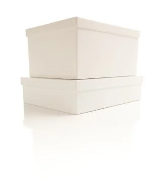 Two Stacked White Boxes with Lids Isolated on a White Background. Stockfoto's