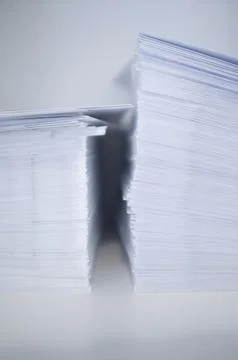 Two Stacks of White Envelopes 스톡 사진