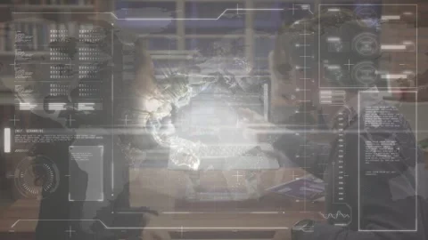 Two staff gesturing at table, controlling holo globe forming, activating HUD Stock Footage 334013660