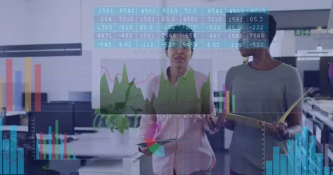Two staff walking office aisle, comparing business figures and causing charts Stock Footage 331048352