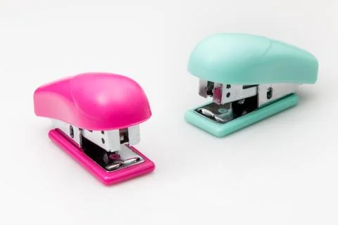 Two Staplers on white background. Stock Photos