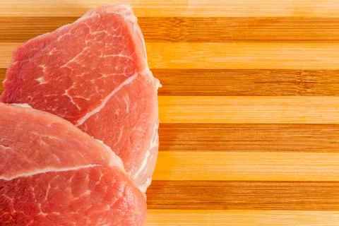 Two steaks on a cutting Board Stock Photos