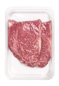 Two steaks in vacuum packaging Stock Photos