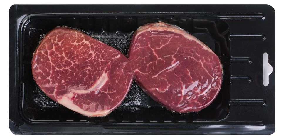 Two steaks in vacuum packaging Stock Photos