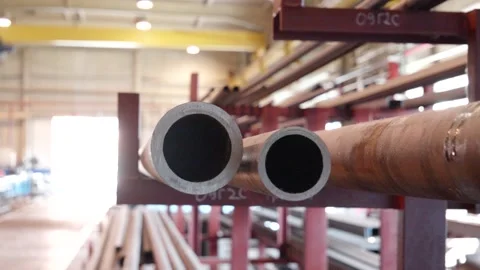 Two steel pipes of different diameters are on the shelves Stock Footage 170699202