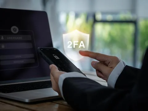 Two steps authentication concept. 2FA in shield icon showing on smart phone.. Stock Photos