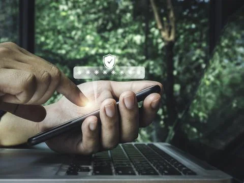 Two steps authentication concept. Virtual safety shield icon while access on  Stock Photos