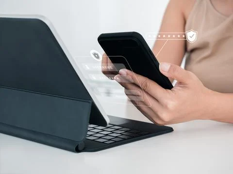 Two steps authentication or 2FA concept. Virtual safety shield icon while acc Stock Photos