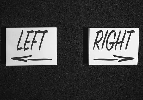 Two  sticky notes on a black background with left and right Stock Photos
