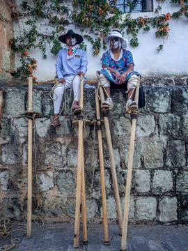 Two stilt walkers Stock Photos