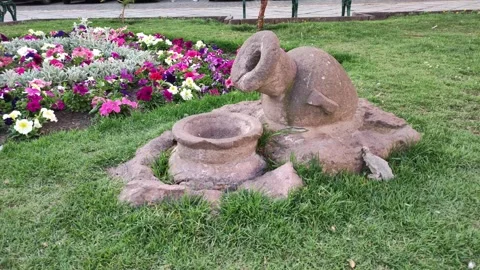 Two stone jugs on the ground of a park in Cusco 動画素材 288602316