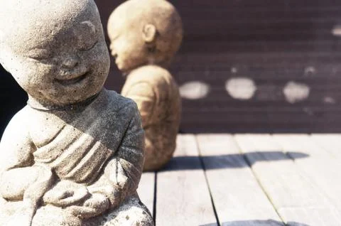 Two stone monks Stock Photos