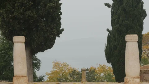 Two stone pillars in garden Stock-Footage 86438701