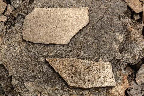Two stone plates lying on the ground Stock-Fotos