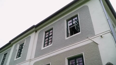 A two-storey building. the manor. an open window in the house Stock Footage 279879694
