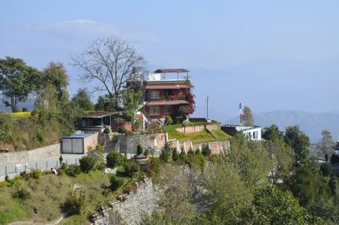 Two-storey house on the mountain, landscape design, India Stock Photos