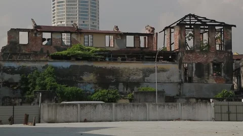 Two-Storey Ruined Building and Menara Komtar in Georgetown, Penang Stock Footage 48139364
