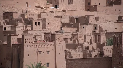 Two storks in a nest on the top of a tower of Ait Ben Haddu Stock Footage 49569523