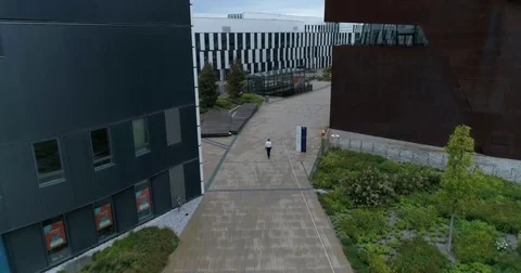 Two strangers are walking towards each other along the street in Montenegro Stock Footage 82242453