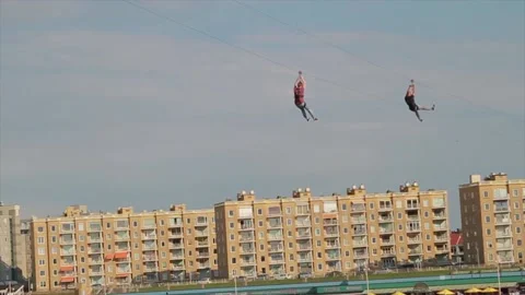 Two strangers gliding fast over the building Stock Footage 213916095