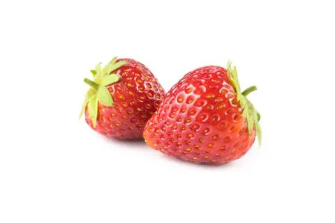 Two strawberries close up on white background Stock Photos