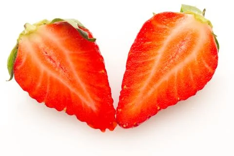 Two strawberries close up on white background Stock Photos