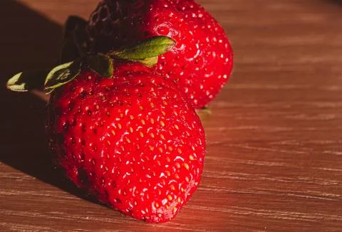 Two strawberries macro Stock Photos