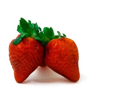 Two strawberries Stock Photos