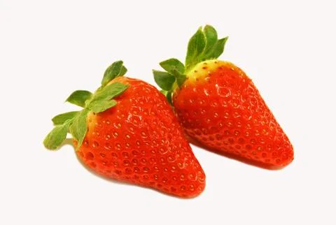 Two strawberries Stock Photos