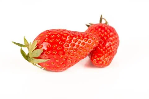 Two strawberries on white background Foto stock