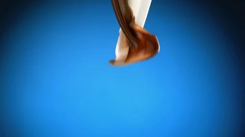 Two stream of milk and chocolate meet Stock-Footage 81805620
