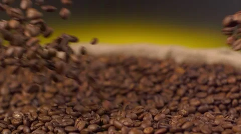Two streams of coffee beans Stock Footage 59554557