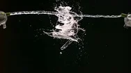 Two Streams Of Water Collide Stock Footage