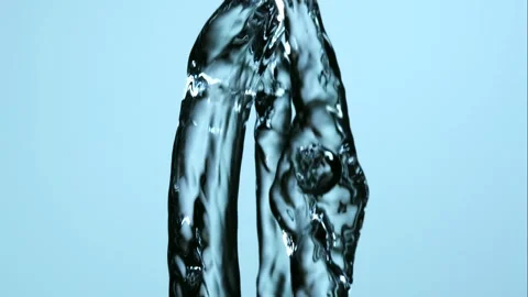 Two Streams Of Water Twisting Together And Colliding In Mid Air Against Stock Footage 326292062