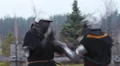 Two strong knights in steel armor hitting each other with swords, slow motion HD Footage