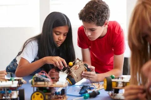 Two Students In After School Computer Coding Class Building And Learning To Stock Photos