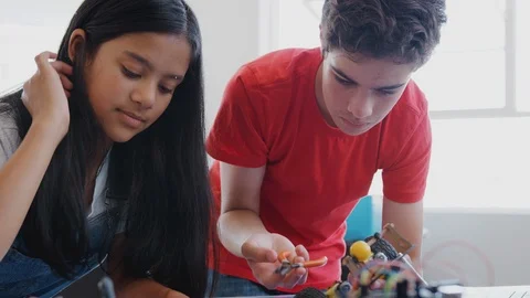 Two Students Building And Programing Robot Vehicle In After School Computer 動画素材 111933465