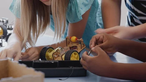 Two Students Building And Programing Robot Vehicle In After School Computer 動画素材 111933674