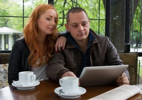 Two students drinking coffee Foto stock